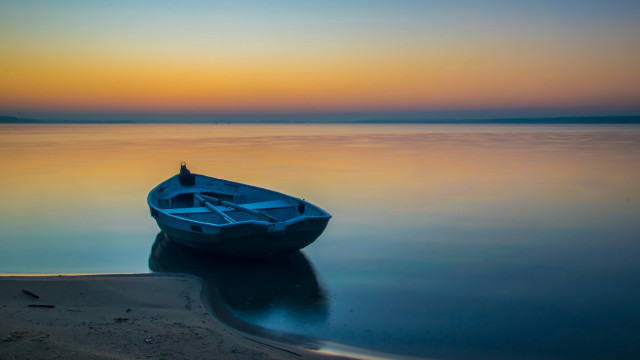 Small boat lake sunset reflection free wallpaper for desktop - medium preview image
