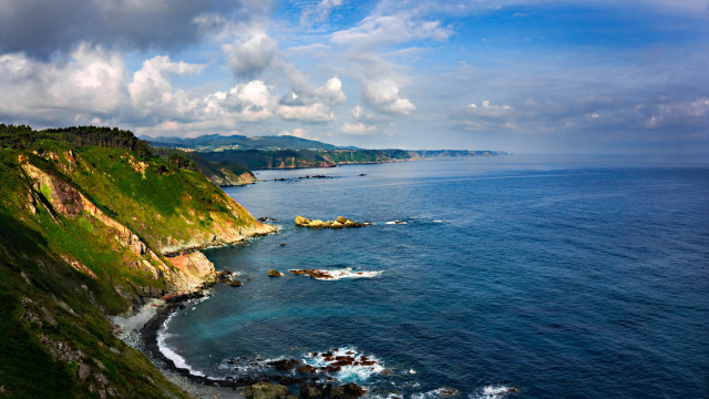 Scenic cliff ocean beach boat free wallpaper for desktop - medium preview image