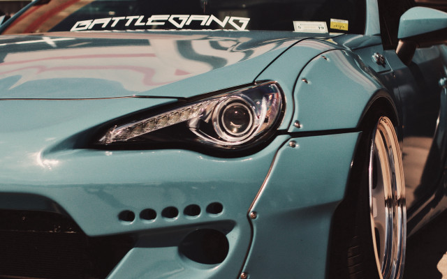 Car battlend sticker closeup beeple free wallpaper for desktop - medium preview image