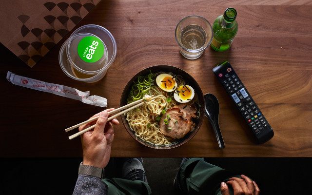 Person holding chopsticks bowl table free wallpaper for desktop - medium preview image