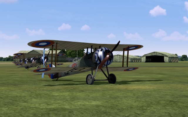 Small airplane grass hangar sky free wallpaper for desktop - medium preview image