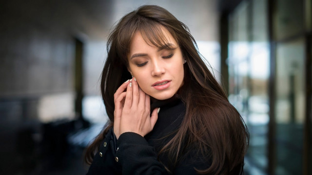 Woman long hair serious ear free wallpaper for desktop - medium preview image