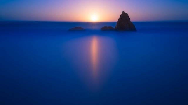 Rock ocean sunset bright sky free wallpaper for desktop - medium preview image