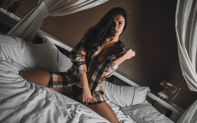 Woman plaid shirt bed sitting free wallpaper for desktop - medium preview image