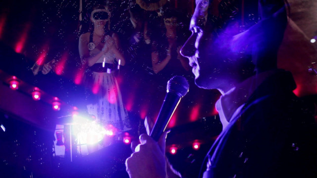 Man holding microphone crowd people free wallpaper for desktop - medium preview image