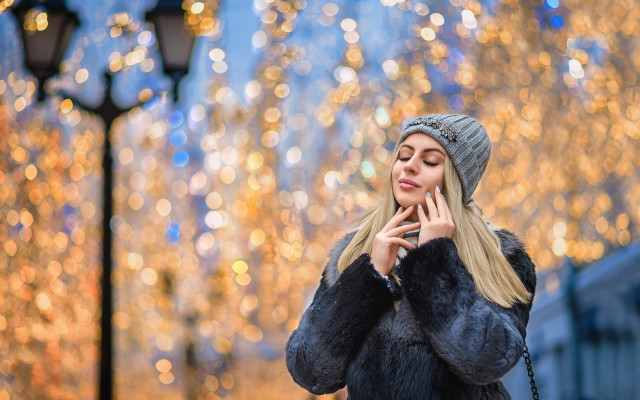 Blonde woman fur coat phone free wallpaper for desktop - medium preview image