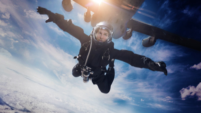 Parachuting man black suit plane free wallpaper for desktop - medium preview image
