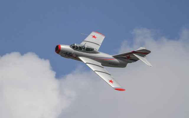 Small airplane cloudy sky red free wallpaper for desktop - medium preview image