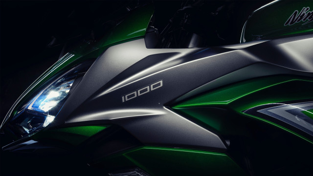Motorcycle green black headlight deconstructivism free wallpaper for desktop - medium preview image