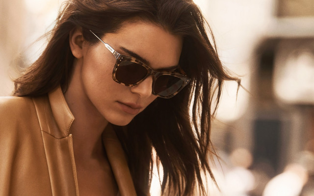 Woman sunglasses tan jacket street free wallpaper for desktop - medium preview image