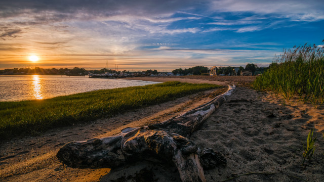 Log sand water sunset bridge free wallpaper for desktop - medium preview image