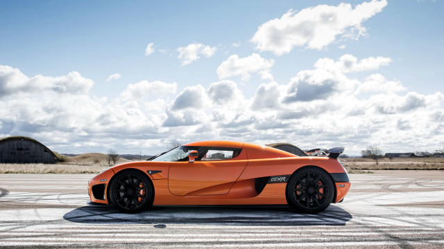Orange sports car runway blue free wallpaper for desktop - medium preview image