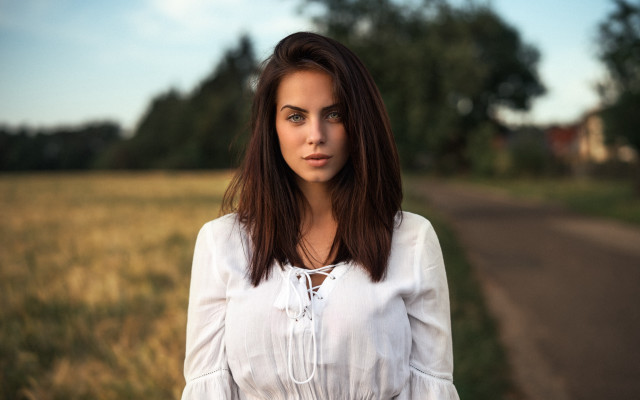 Woman field road trees bokeh free wallpaper for desktop - medium preview image