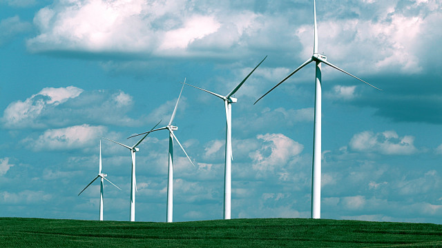 Wind turbines green field cloudy free wallpaper for desktop - medium preview image