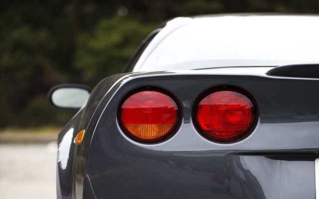 Tail light forest road blurry free wallpaper for desktop - medium preview image