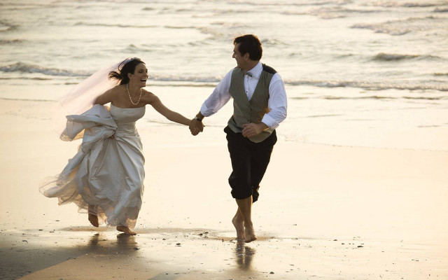 Bride groom beach holding hands free wallpaper for desktop - medium preview image