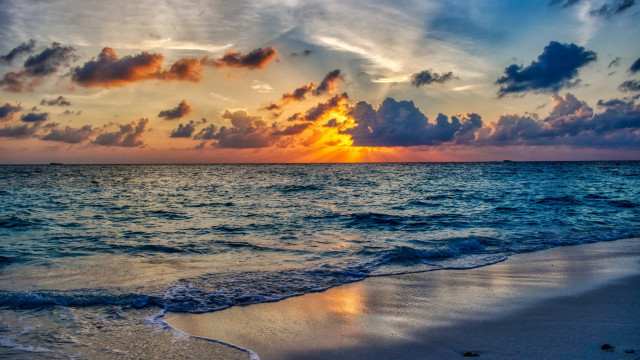 Sunset ocean clouds waves boat free wallpaper for desktop - medium preview image