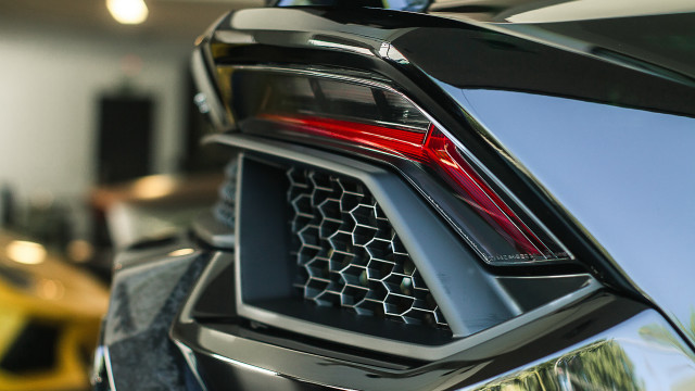 Car tail light grilles showroom free wallpaper for desktop - medium preview image