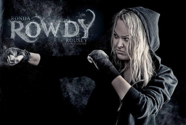 Woman hoodie holding glove wall free wallpaper for desktop - medium preview image