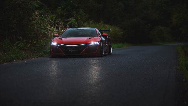 Red sports car headlights forest free wallpaper for desktop - medium preview image