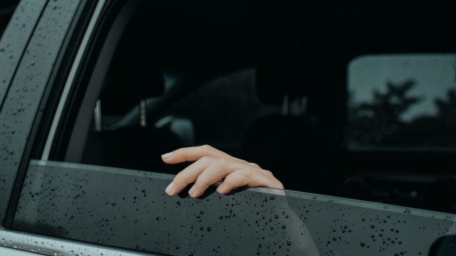 Hand rain drops car window free wallpaper for desktop - medium preview image