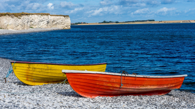 Lake shore boats cliff clouds free wallpaper for desktop - medium preview image