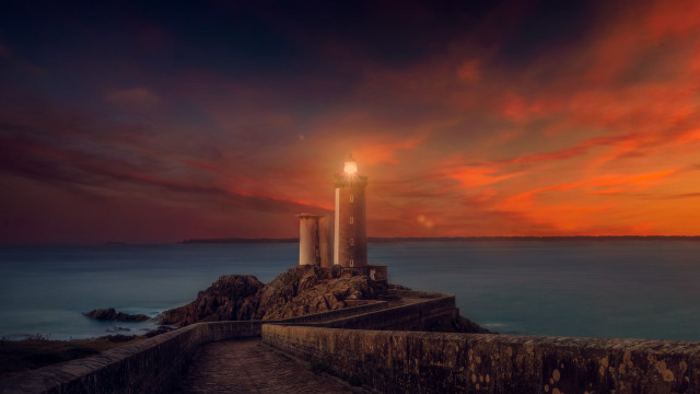 Lighthouse rocky cliff sunset red free wallpaper for desktop - medium preview image