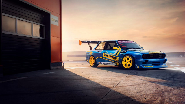 Blue yellow car parking lot free wallpaper for desktop - medium preview image