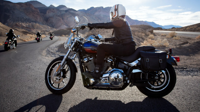 Man riding motorcycle mountains sky free wallpaper for desktop - medium preview image