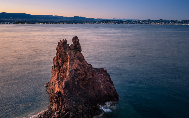 Rock water mountain sunset beach free wallpaper for desktop - medium preview image