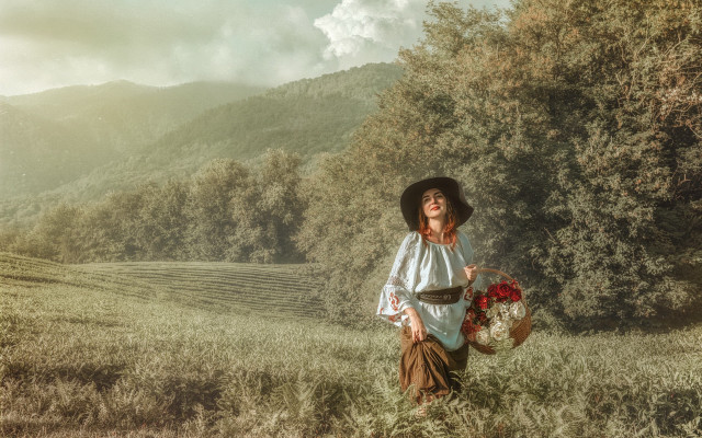 Woman hat dress bouquet mountains free wallpaper for desktop - medium preview image
