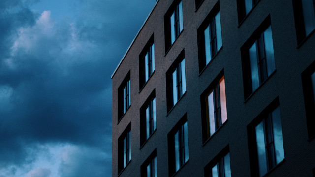 Building clock cloudy sky minimalism free wallpaper for desktop - medium preview image