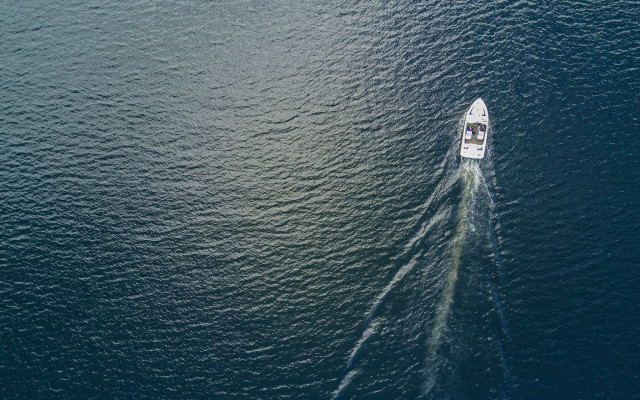 Ocean boat cinematic starry night free wallpaper for desktop - medium preview image