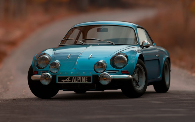 Blue car driving forest sunny free wallpaper for desktop - medium preview image