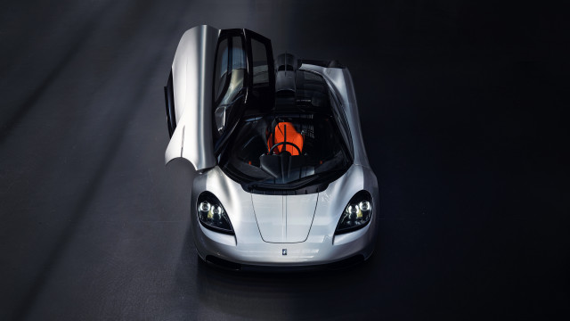 Silver sports car orange headlight free wallpaper for desktop - medium preview image