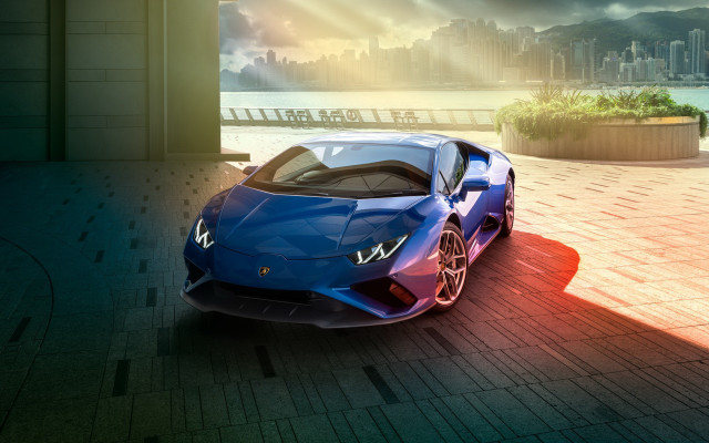 Blue sports car cityscape render free wallpaper for desktop - medium preview image