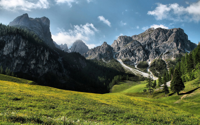 Grassy field mountain clouds road free wallpaper for desktop - medium preview image