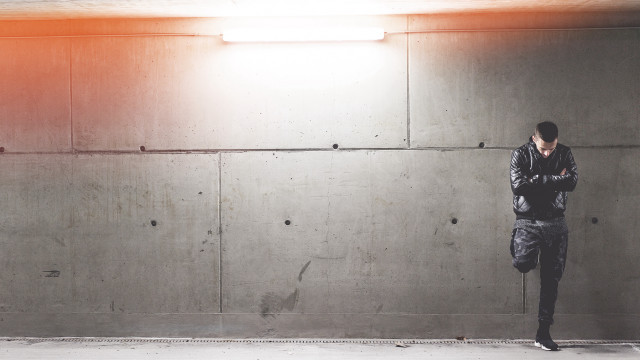 Man standing room cellphone light free wallpaper for desktop - medium preview image