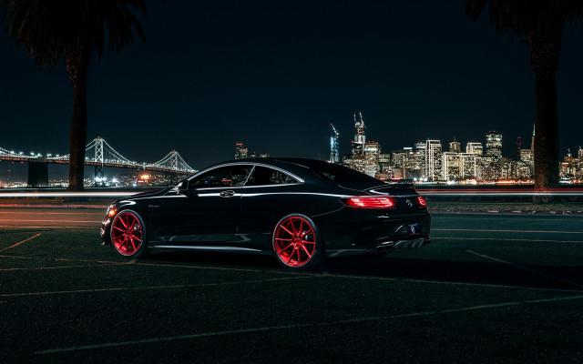 Black car red rims city free wallpaper for desktop - medium preview image