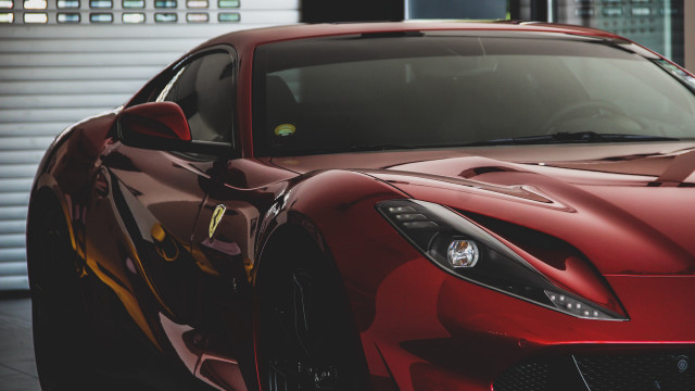 Red sports car garage window free wallpaper for desktop - medium preview image
