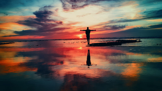 Beach sunset cross person cinematic free wallpaper for desktop - medium preview image