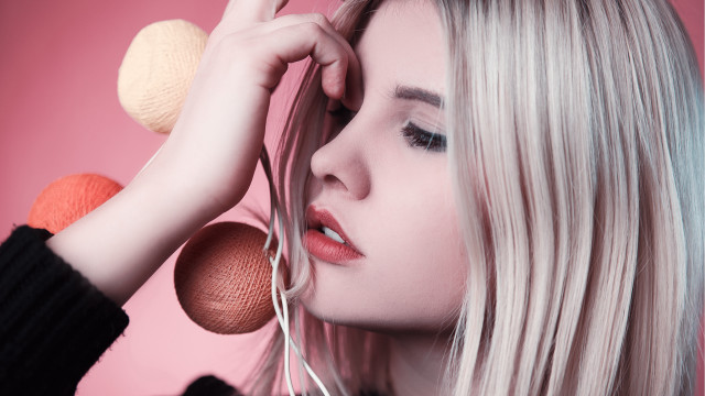 Woman blonde hair yarn ear free wallpaper for desktop - medium preview image