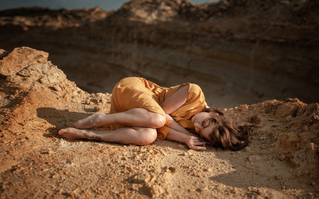 Woman yellow dress rock beach free wallpaper for desktop - medium preview image