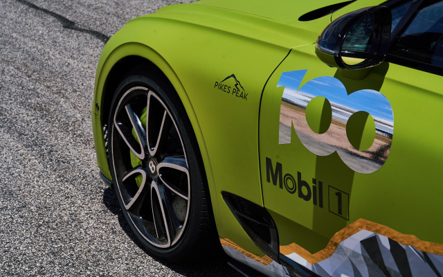 Green sports car number sticker free wallpaper for desktop - medium preview image