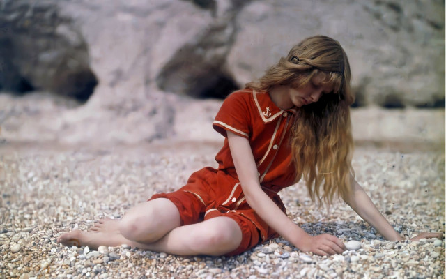 Woman rocky beach boulder blonde free wallpaper for desktop - medium preview image