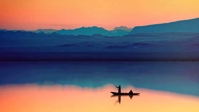 Lake sunset mountains boat figure free wallpaper for desktop - medium preview image