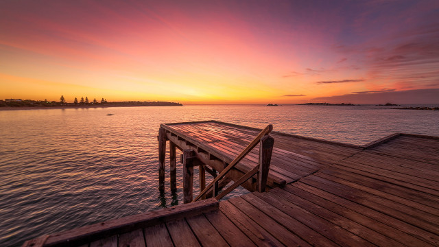 Wooden dock sunset boat mountain free wallpaper for desktop - medium preview image