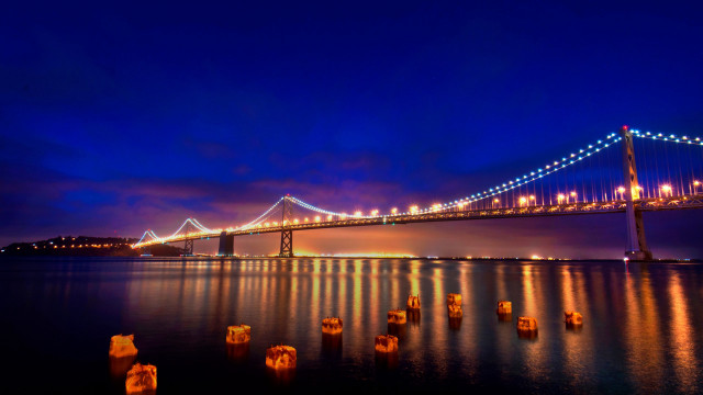 Glowing bridge reflection city lights free wallpaper for desktop - medium preview image
