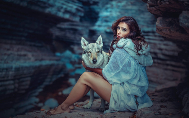 Woman blue dress wolf cave free wallpaper for desktop - medium preview image