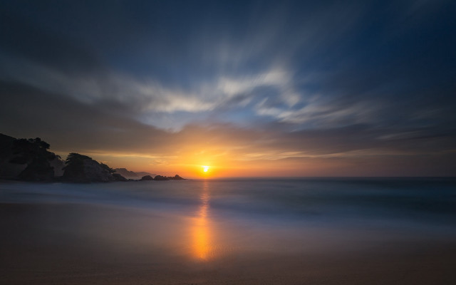 Sunset beach water rock outcropping free wallpaper for desktop - medium preview image